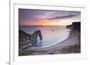 A Colourful Sunset over Durdle Door-Julian Elliott-Framed Photographic Print