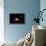 A Comet Hitting an Alien Planet-null-Framed Art Print displayed on a wall