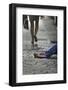 A Commuter Walks by a Homeless Man in a Deserted Shopping Area During a 24-Hour Strike in Athens-Yannis Behrakis-Framed Photographic Print