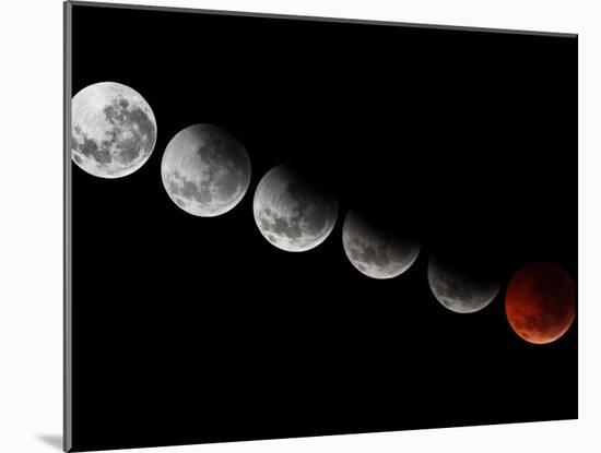 A Composite Showing Different Stages of the 2010 Solstice Total Moon Eclipse-Stocktrek Images-Mounted Photographic Print