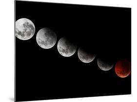 A Composite Showing Different Stages of the 2010 Solstice Total Moon Eclipse-Stocktrek Images-Mounted Photographic Print