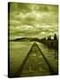 A Concrete Jetty on Water under a Stormy Sky-Cristina Carra Caso-Stretched Canvas