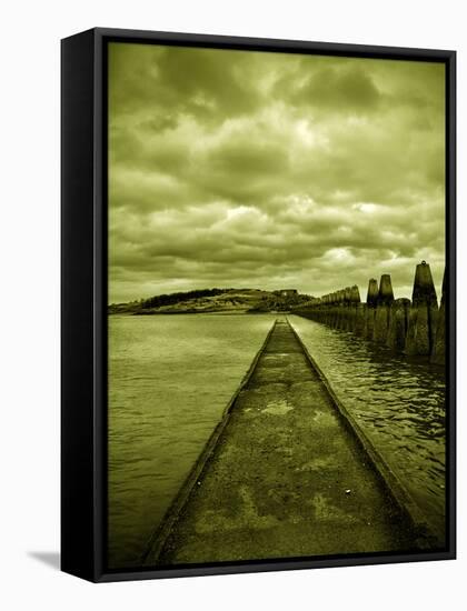 A Concrete Jetty on Water under a Stormy Sky-Cristina Carra Caso-Framed Stretched Canvas