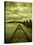 A Concrete Jetty on Water under a Stormy Sky-Cristina Carra Caso-Stretched Canvas
