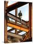 A Construction Worker Stands on a Steel Beam While Working on a High Rise Building-null-Stretched Canvas