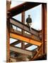 A Construction Worker Stands on a Steel Beam While Working on a High Rise Building-null-Mounted Photographic Print