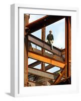 A Construction Worker Stands on a Steel Beam While Working on a High Rise Building-null-Framed Photographic Print