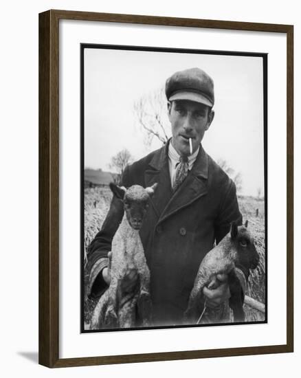 A Cotswolds Farmer Holds Two New-Born Lambs-Henry Grant-Framed Photographic Print