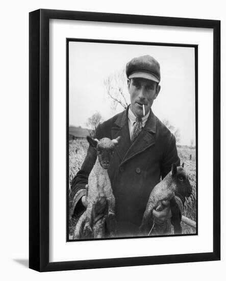 A Cotswolds Farmer Holds Two New-Born Lambs-Henry Grant-Framed Photographic Print