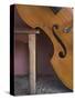 A Counterbass Leaning Against a Wooden Table, Trinidad, Sancti Spiritus Province, West Indies-Eitan Simanor-Stretched Canvas