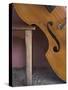 A Counterbass Leaning Against a Wooden Table, Trinidad, Sancti Spiritus Province, West Indies-Eitan Simanor-Stretched Canvas