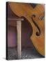 A Counterbass Leaning Against a Wooden Table, Trinidad, Sancti Spiritus Province, West Indies-Eitan Simanor-Stretched Canvas