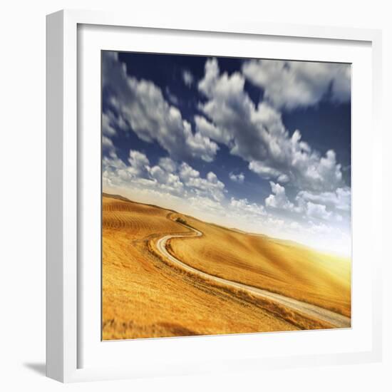 A Country Road in Field Against Moody Sky, Tuscany, Italy-null-Framed Photographic Print