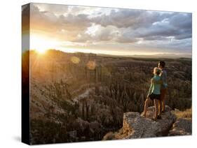 A Couple at Sunset in Bryce Canyon National Park in the Summer Overlooking the Canyon-Brandon Flint-Stretched Canvas