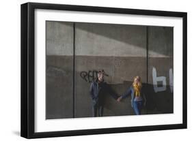 A Couple Holding Hands in an Underpass-Clive Nolan-Framed Photographic Print