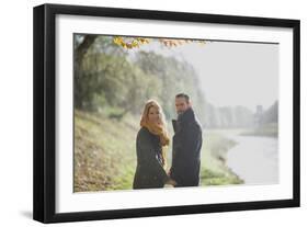 A Couple Holding Hands-Clive Nolan-Framed Photographic Print