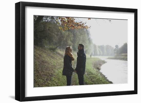 A Couple Holding Hands-Clive Nolan-Framed Photographic Print