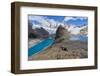 A couple in mountain gear rests on rocks with view to Lago de los Tres and Mount Fitz Roy, Patagoni-Fernando Carniel Machado-Framed Photographic Print
