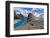 A couple in mountain gear rests on rocks with view to Lago de los Tres and Mount Fitz Roy, Patagoni-Fernando Carniel Machado-Framed Photographic Print