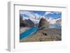 A couple in mountain gear rests on rocks with view to Lago de los Tres and Mount Fitz Roy, Patagoni-Fernando Carniel Machado-Framed Photographic Print