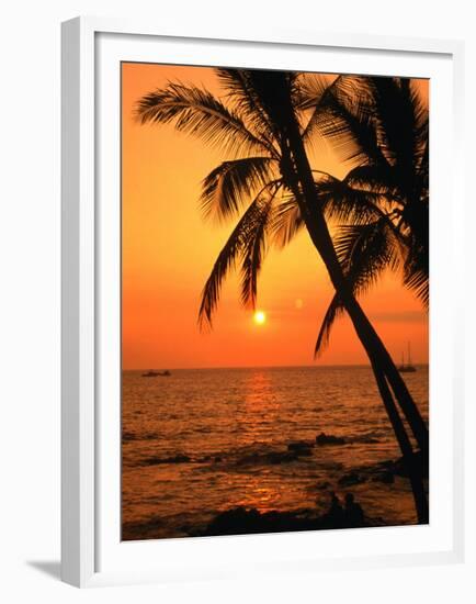 A Couple in Silhouette, Enjoying a Romantic Sunset Beneath the Palm Trees in Kailua-Kona, Hawaii-Ann Cecil-Framed Premium Photographic Print