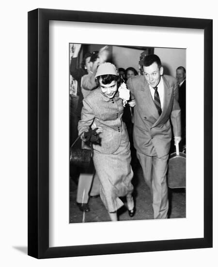 A Couple Leave their Wedding and onto their Honeymoon, Ca. 1955-null-Framed Photographic Print