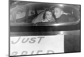 A Couple Peers Out of the Back Window on their Wedding Day, Ca. 1953-null-Mounted Photographic Print