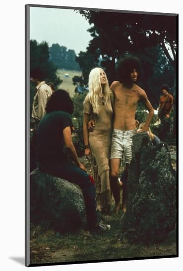 A Couple Stand Together at the Woodstock Music and Arts Fair, Bethel, New York, August 1969-John Dominis-Mounted Photographic Print