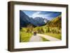 A Couple Strolling in the Alps, Holding Hands in the Fall-Sheila Haddad-Framed Photographic Print