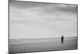 A Couple Together on a Winter Sday on a Beach-Clive Nolan-Mounted Photographic Print