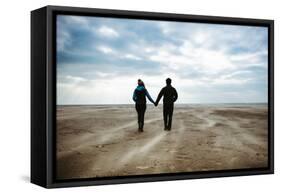 A Couple Together on a Winters Day on a Beach-Clive Nolan-Framed Stretched Canvas