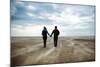 A Couple Together on a Winters Day on a Beach-Clive Nolan-Mounted Photographic Print