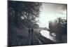 A Couple Walking Along a Canal on a Wet Day-Clive Nolan-Mounted Photographic Print