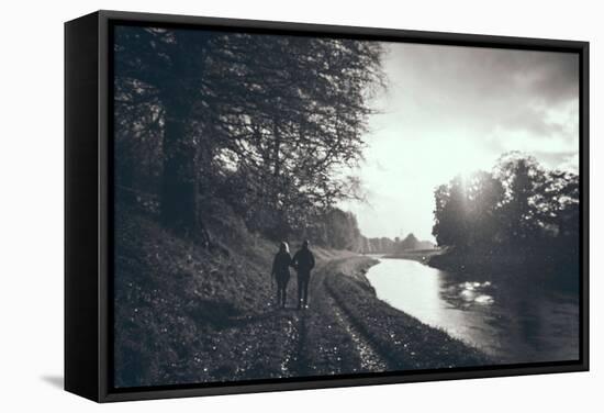 A Couple Walking Along a Canal on a Wet Day-Clive Nolan-Framed Stretched Canvas