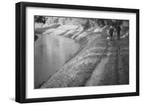 A Couple Walking Along a Canal on a Wet Day-Clive Nolan-Framed Photographic Print