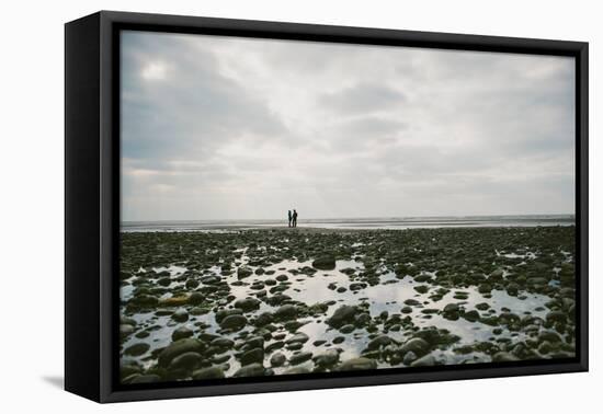 A Couple Walking Together on a Winter Day on a Beach-Clive Nolan-Framed Stretched Canvas