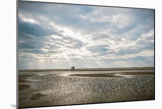 A Couple Walking Together on a Winter Day on a Beach-Clive Nolan-Mounted Photographic Print