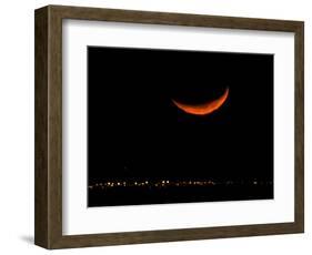 A Crescent Moon Dwarfs the Lights of Fort Riley Army Base in Central Kansas, January 22, 2007-Charlie Riedel-Framed Photographic Print