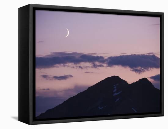 A Crescent Moon Rises over Clouds and Mountains at Twilight in Glacier Peak Wilderness, Washington.-Ethan Welty-Framed Stretched Canvas