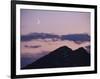 A Crescent Moon Rises over Clouds and Mountains at Twilight in Glacier Peak Wilderness, Washington.-Ethan Welty-Framed Photographic Print