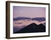 A Crescent Moon Rises over Clouds and Mountains at Twilight in Glacier Peak Wilderness, Washington.-Ethan Welty-Framed Photographic Print