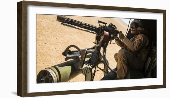 A Crew Chief Mounts a M134 Minigun-null-Framed Photographic Print