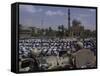 A Crowd of Iraqi Protesters Pray in Front of a U.S. Military Checkpoint-null-Framed Stretched Canvas