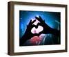 A Crowd of People at a Concert with a Heart Shaped Hand Shadow-graphicphoto-Framed Photographic Print