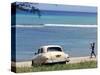 A Cuban Boy Plays Ball at the Baracoa Beach West of Havana, Cuba-null-Stretched Canvas