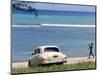 A Cuban Boy Plays Ball at the Baracoa Beach West of Havana, Cuba-null-Mounted Photographic Print