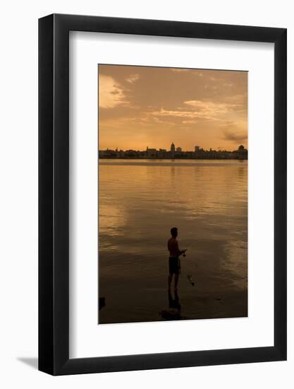 A Cuban Fishing off the City of Havana. in between the Capitol Building. Cuba-Toniflap-Framed Photographic Print