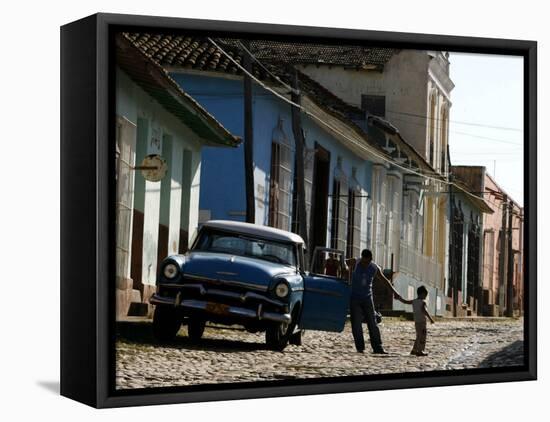 A Cuban Man Gets out of His Car with His Child-Javier Galeano-Framed Stretched Canvas