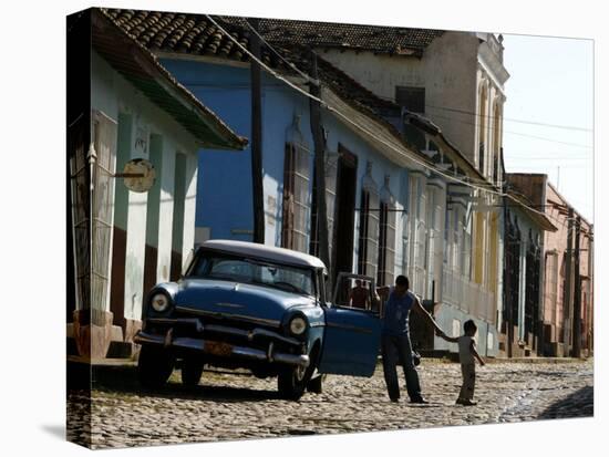 A Cuban Man Gets out of His Car with His Child-Javier Galeano-Stretched Canvas