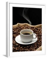 A Cup of Coffee on a Jute Sack Full of Coffee Beans-Gustavo Andrade-Framed Photographic Print